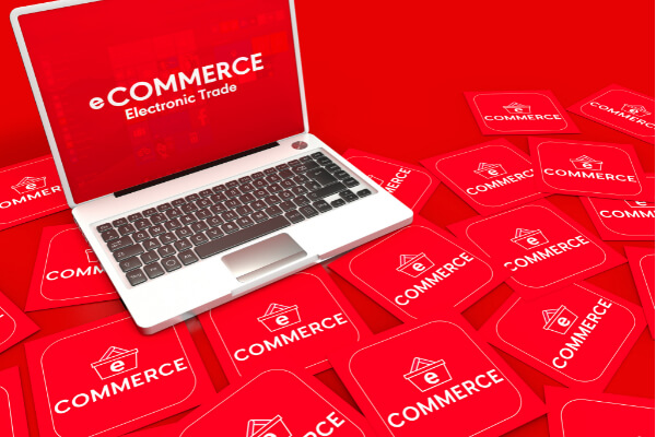 A red e-commerce background in a laptop