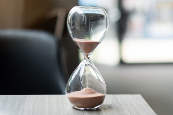 A time hourglass in a business office