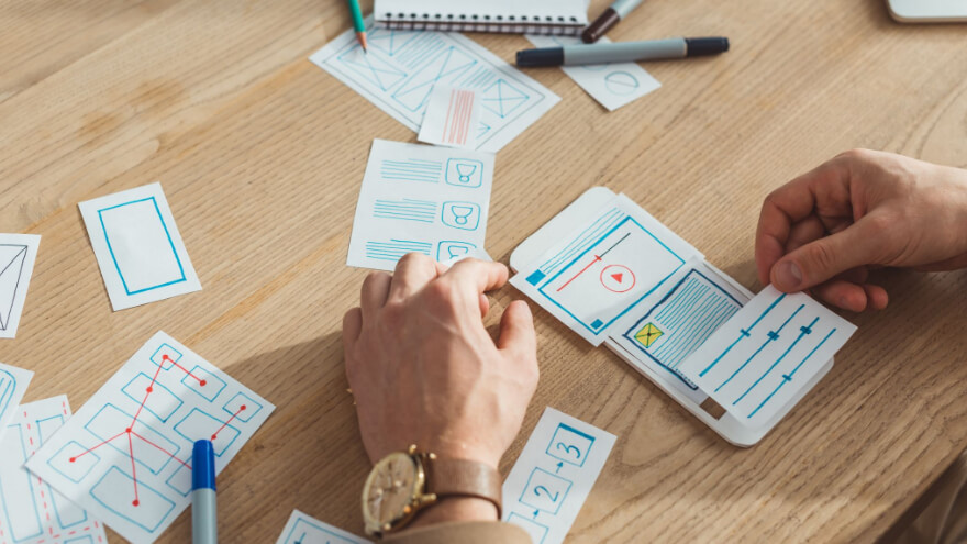 An UX designer is prototyping a mobile version