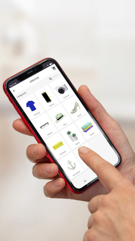 A person is showing a custom e-commerce app for mobile